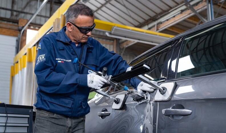 Paintless Dent Repair in action